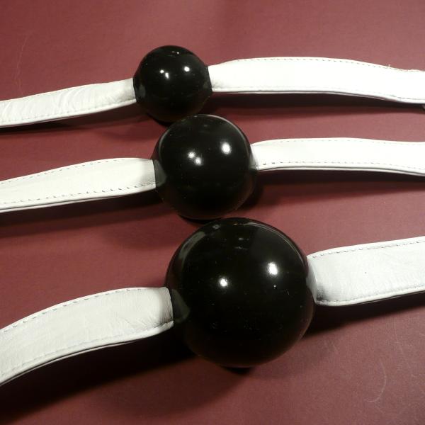 Silicone Ball Gag, black (with white leather strap)
